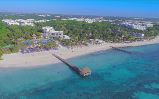 beachfront investment Riviera Maya aerial view of Playa del Carmen coastline and oceanfront properties