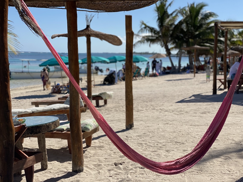 Rental income Playa del Carmen 2025 beach lifestyle hammock