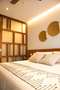 Luxury bedroom design with high-end finishes at IKUKU ready to move in condos Playa del Carmen